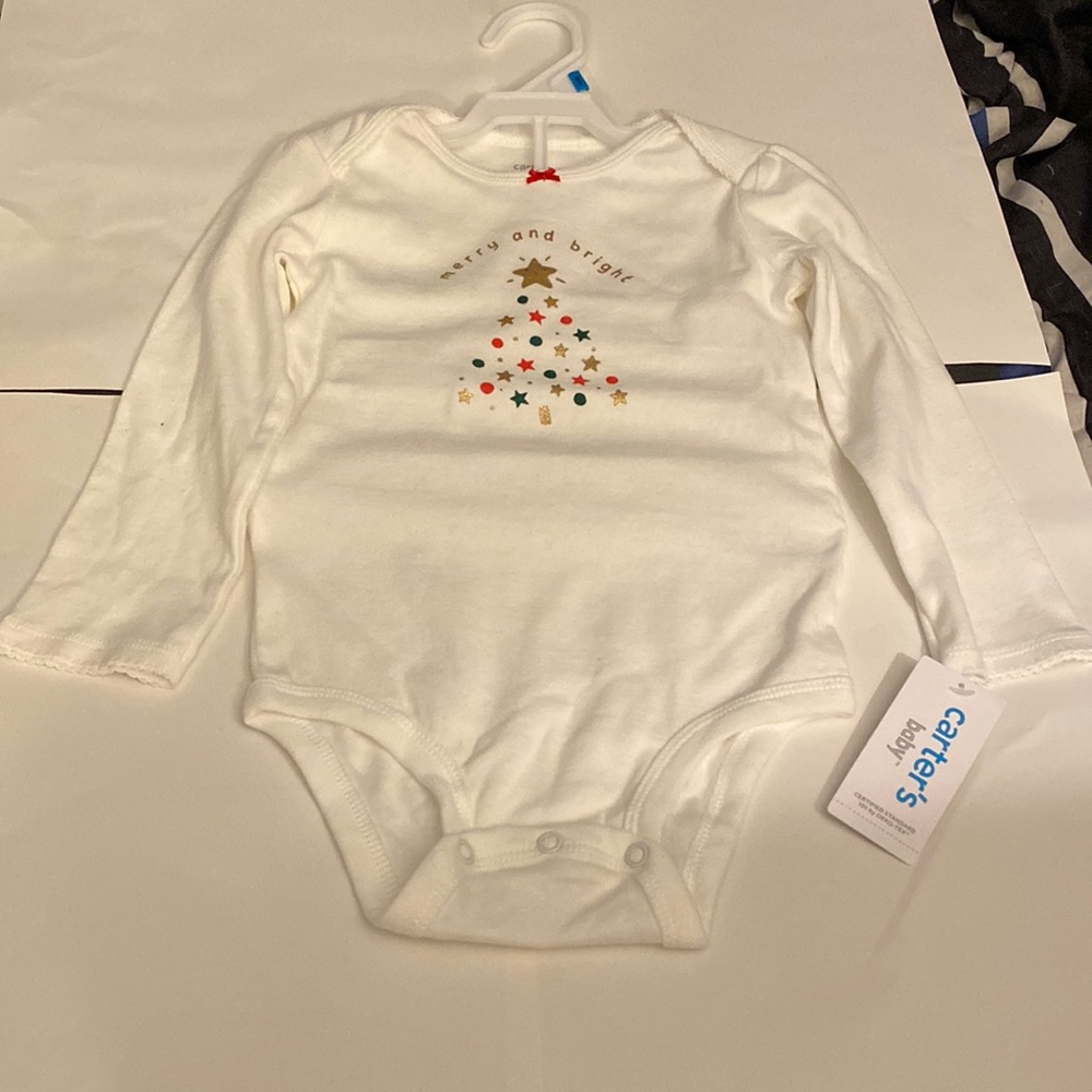 Carter’s baby girls white Christmas tree onsie. Never worn with tag. Size 24M